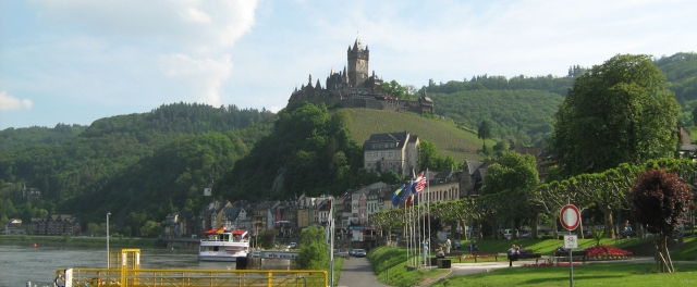 a fairytale castle on top of a small hill in cocham